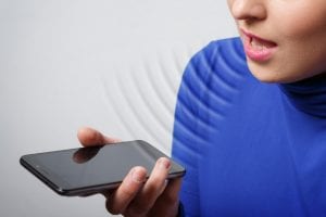 Woman using the voice recognition function, phones , technology